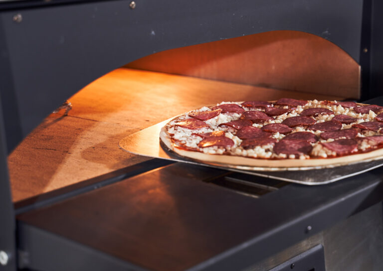Pizza steel being used