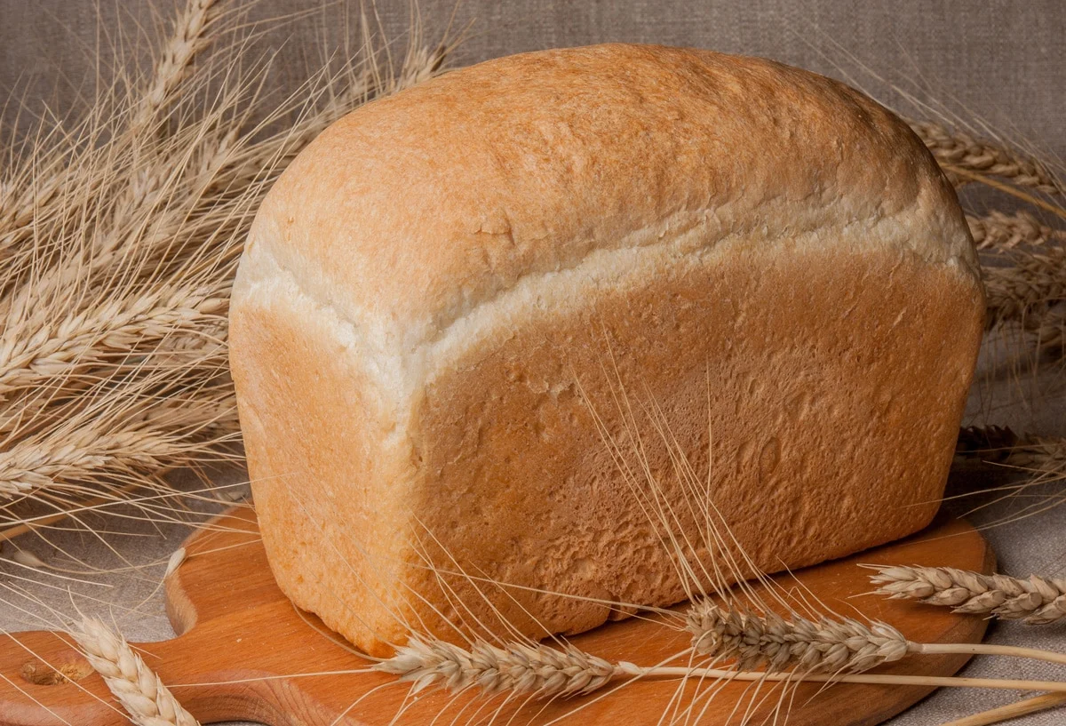 https://www.deliverdeli.com/wp-content/uploads/2021/08/white-bread-loaf-1-jpg.webp