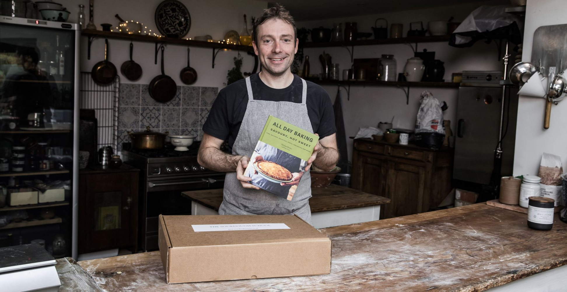 Michael James All Day Baking - Michael with the book