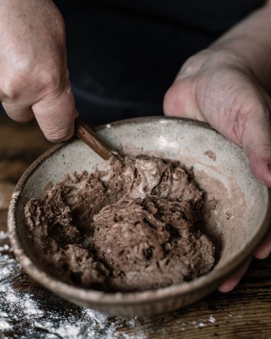 Chocolate sourdough bread being mixed