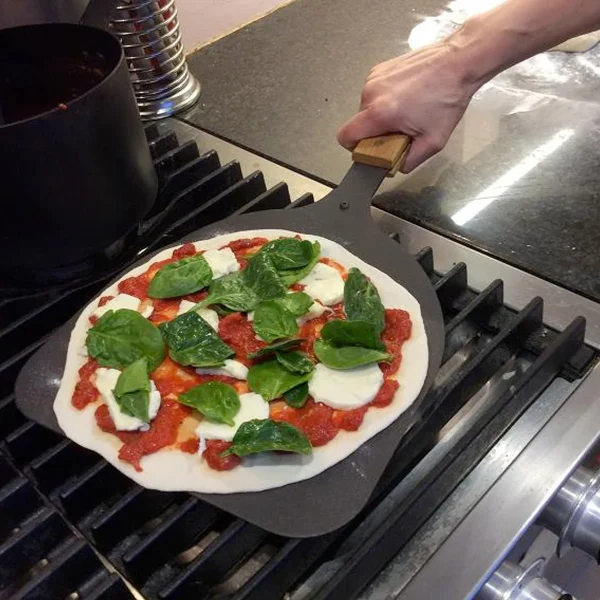 Pizza & Bread Peel - Netherton Foundry being used