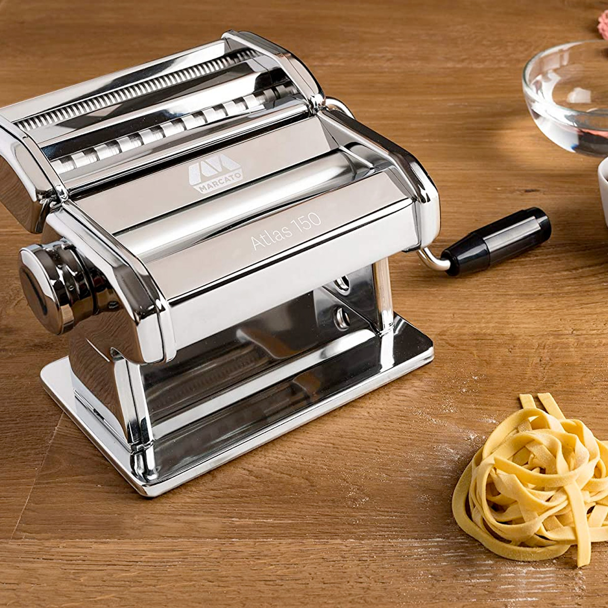 Marcato Atlas 150 Pasta Machine with some freshly made pasta in a lifestyle setting
