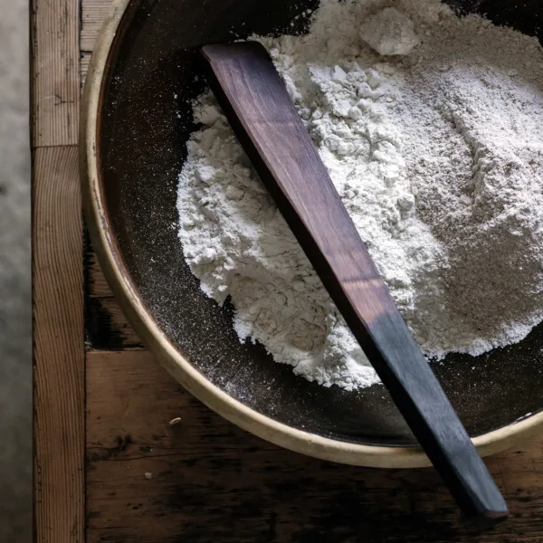 Wooden spatula with flour